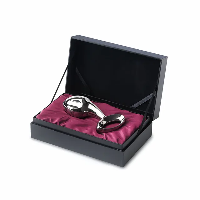 polished Njoy Pure Plug 2.0 in a black presentation box with pink satin lining