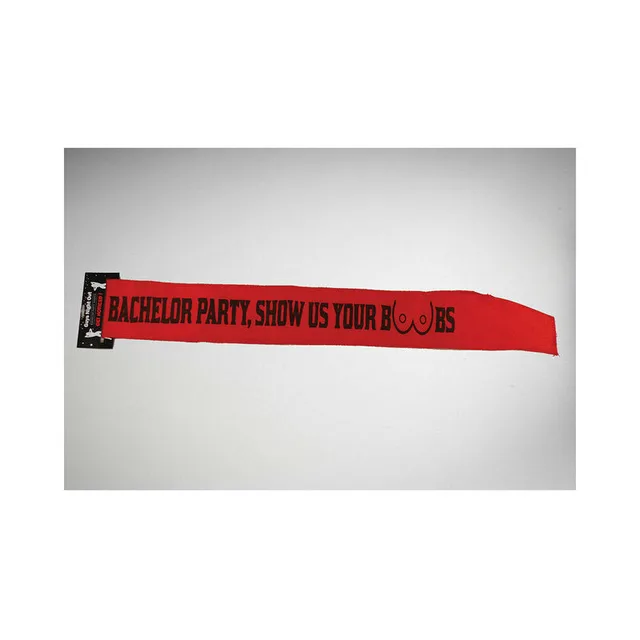 red bachelor party sash with Show Us Your Boobs text and tuxedo graphics