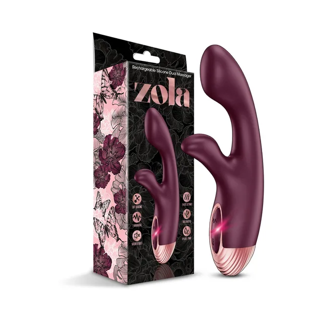 Burgundy Zola warming dual massager beside floral retail box