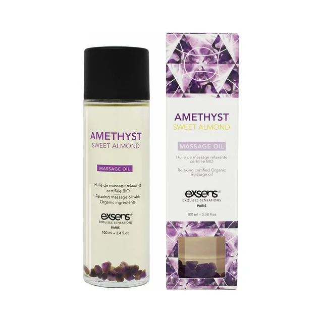 clear Exsens Amethyst Sweet Almond oil with purple crystals beside carton