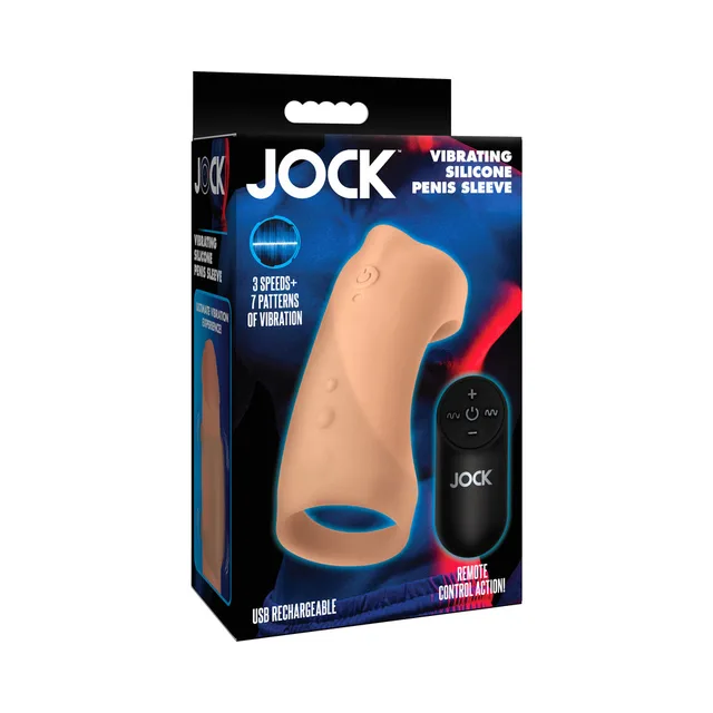 Medium-tan JOCK vibrating silicone penis sleeve and remote shown on retail box