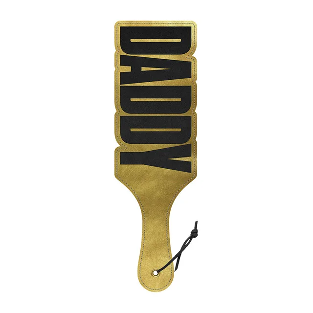 Wood Rocket Daddy gold cutout faux leather paddle full front view with cutout lettering and wrist cord