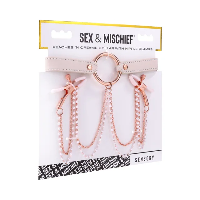 peach collar with rose-gold ring and two pearl-chain nipple clamps