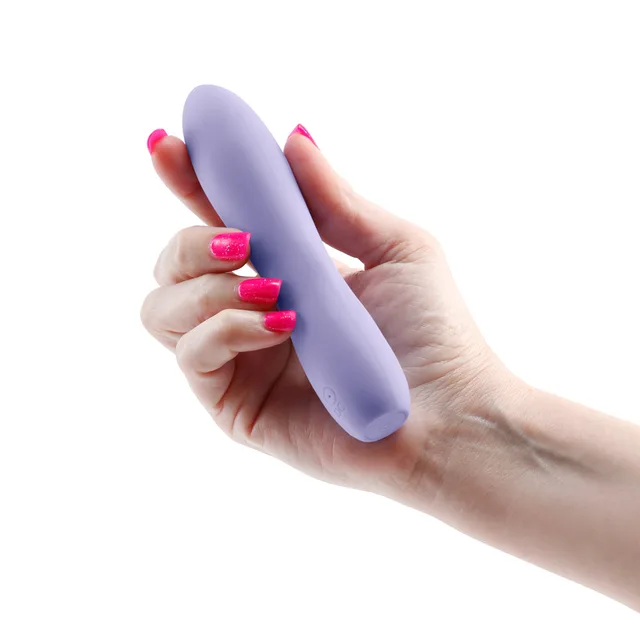 Compact purple INYA Ruse vibrator held in hand