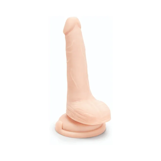 Angled front view of vanilla 6-inch dildo with sculpted balls