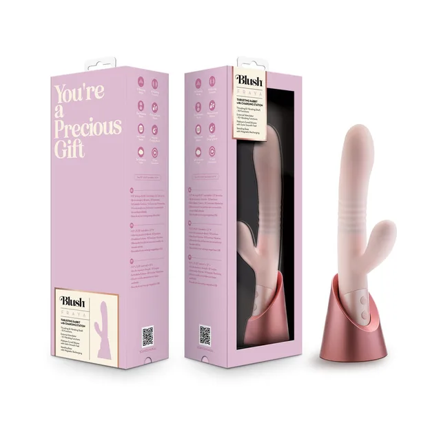 light pink Blush Fraya dual-arm rabbit vibrator beside pink window box