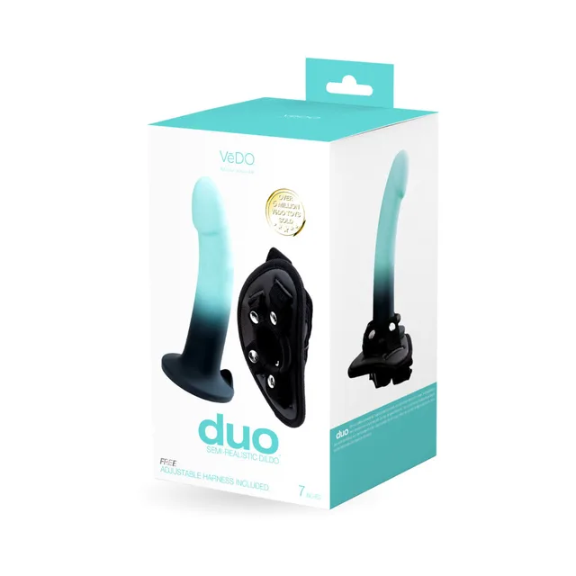 turquoise and black VeDO Duo silicone dildo with black harness pictured on box