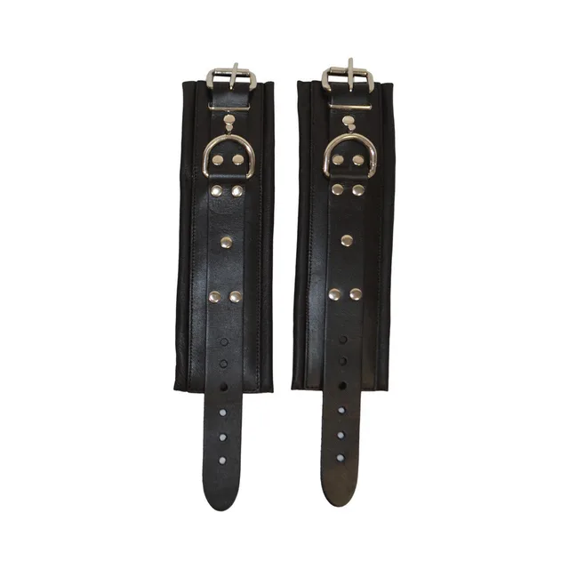 Prowler RED S/M lockable wrist cuffs laid flat with adjustment holes