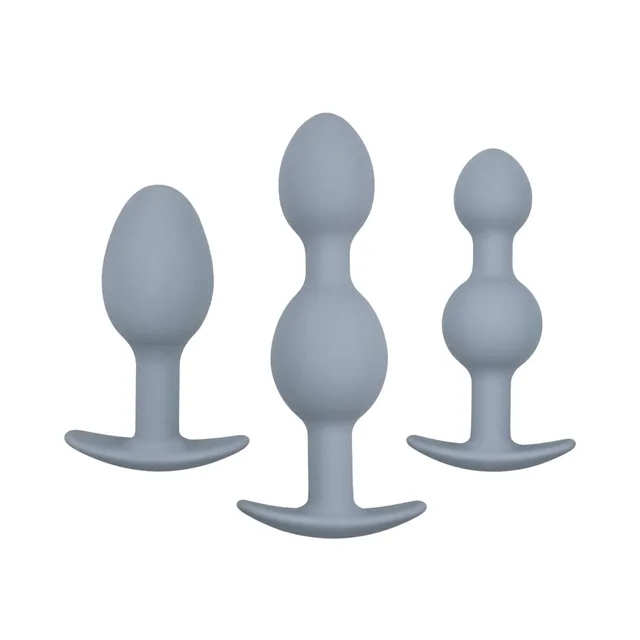 Three gray beaded silicone plugs arranged in graduated heights