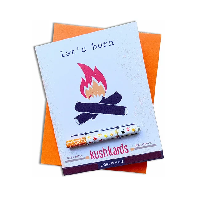 white Let's Burn KushKard with campfire artwork, one-hitter and orange envelope