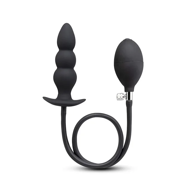 b-Vibe black inflatable plug standing beside hose and hand pump