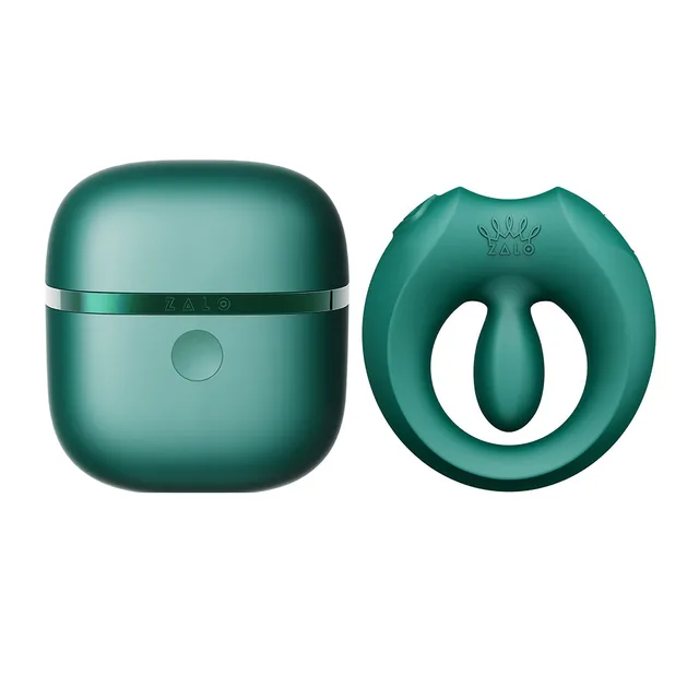 Zalo Legend Apis Turquoise Green wearable ring vibrator set open ring beside the matching rounded charging case