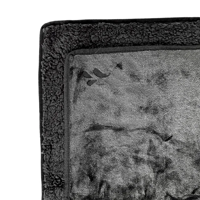 Splash Blanket The OG large black blanket corner close-up with textured reverse