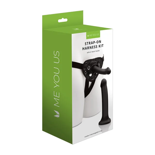 Me You Us black strap-on harness kit with two dildos displayed on green box