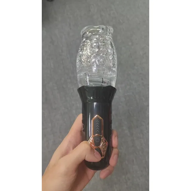 hand holding black Male Rose handle with clear textured cup attached