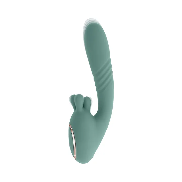 Three-quarter view of mint Evolved vibrator with textured shaft and three prongs