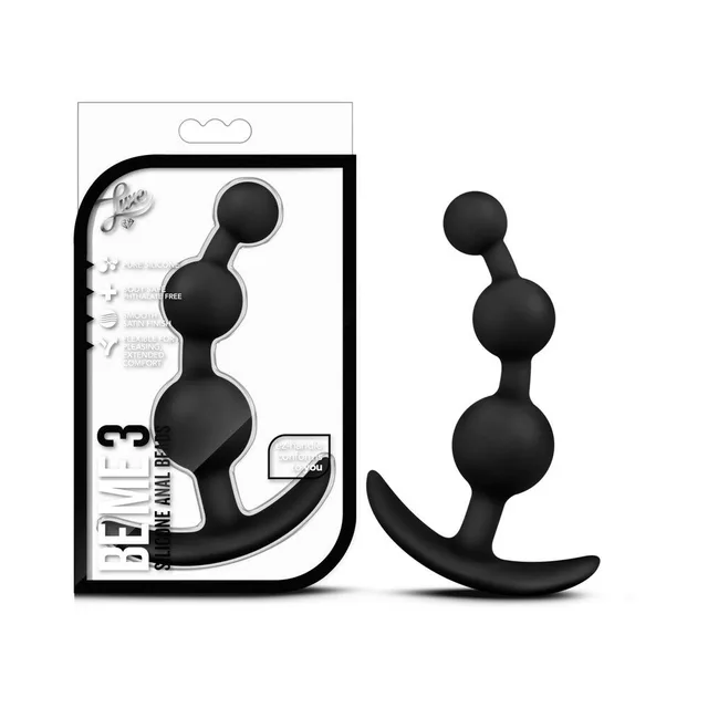 Luxe Be Me 3 Black plug beside white retail package