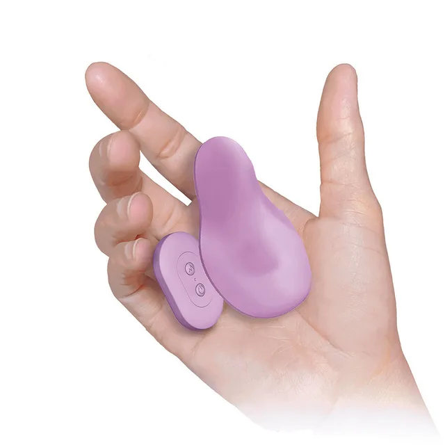 Ultra Kitty Kitty purple panty vibrator held in an open hand