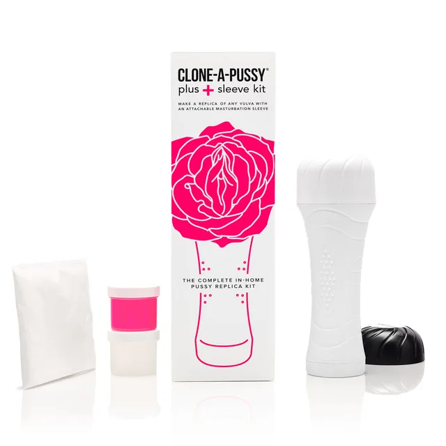 Clone-A-Pussy Plus hot-pink casting kit beside white-and-pink retail box and separate containers