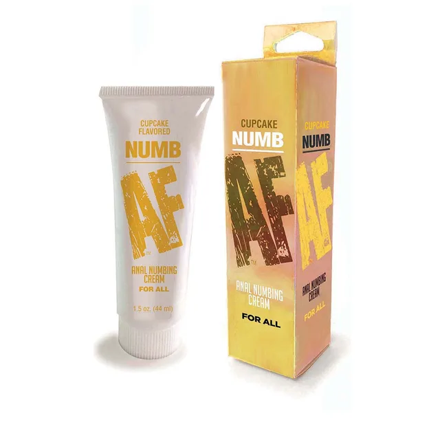 Cupcake white cream tube beside yellow carton