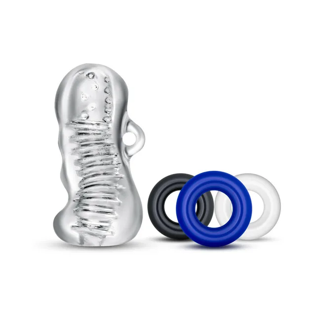 Blush Quickie Kit clear stroker and rings upright clear textured sleeve beside clear blue and black rings