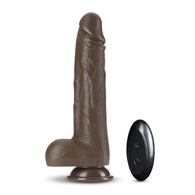 Upright brown Dr. Murphy dildo beside black wireless remote
