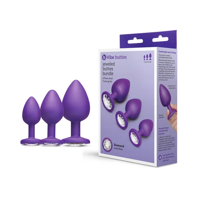 Purple b-Vibe Jewel Butties three-plug bundle beside retail box