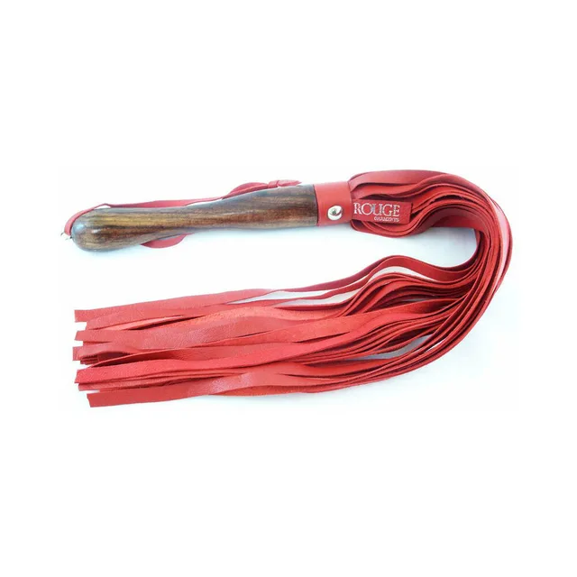 red Rouge leather flogger with polished wooden handle and wrist loop