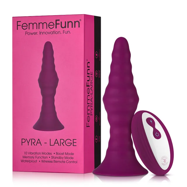 FemmeFunn Pyra Large fuchsia contoured plug and remote beside box