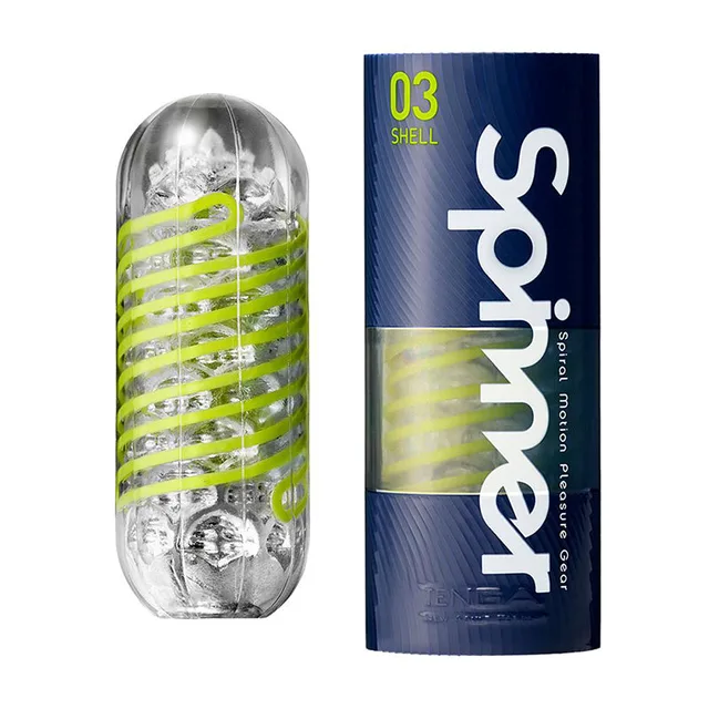 Tenga Spinner 03 Shell clear capsule with lime spiral ribs beside navy-and-lime cylindrical carton