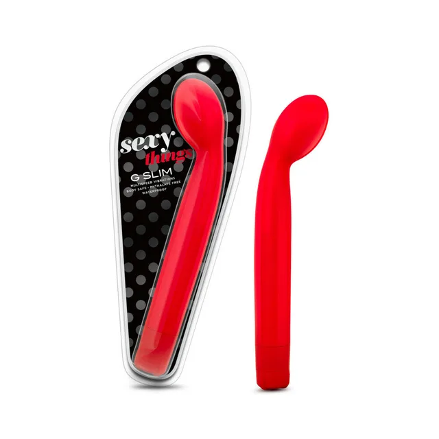 Sexy Things G Slim Red Vibrator red vibrator beside black polka-dot case