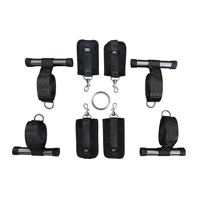 Black padded cuffs, door straps, clips and center ring arranged together