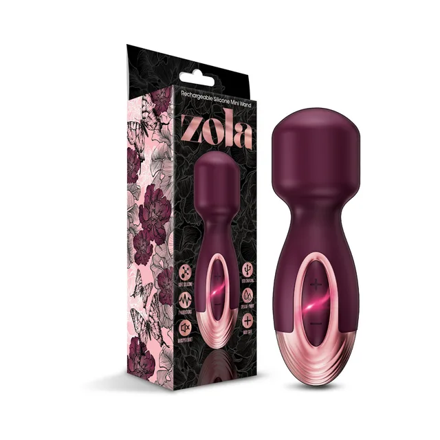 Burgundy Zola mini wand massager beside floral retail box