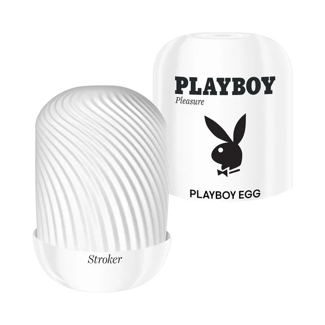 White ribbed Playboy Egg Stroker sleeve beside its case