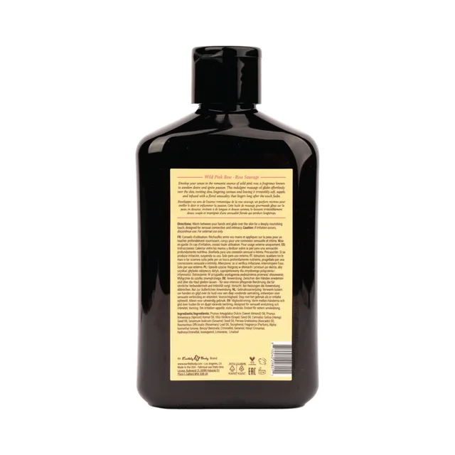 Back label of 8.4 oz wild pink rose massage oil bottle