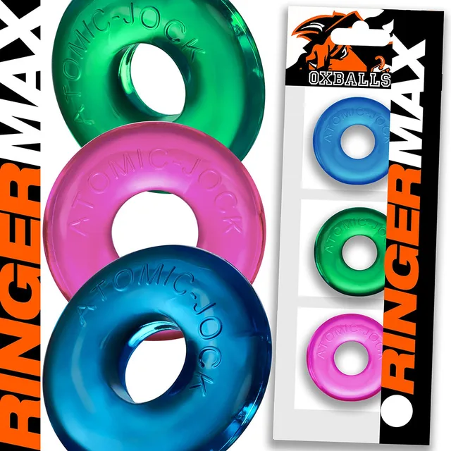 green pink and blue OxBalls Ringer Max rings beside black white sleeve