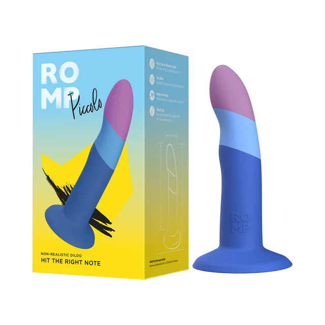 ROMP Piccolo blue purple and pink curved dildo beside colorful box