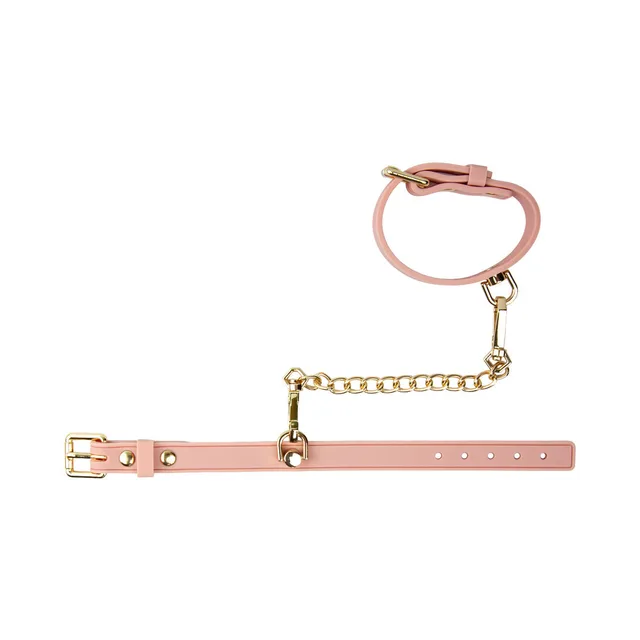 Temptasia Ardor pink wrist and ankle restraints single cuff connected to an open strap