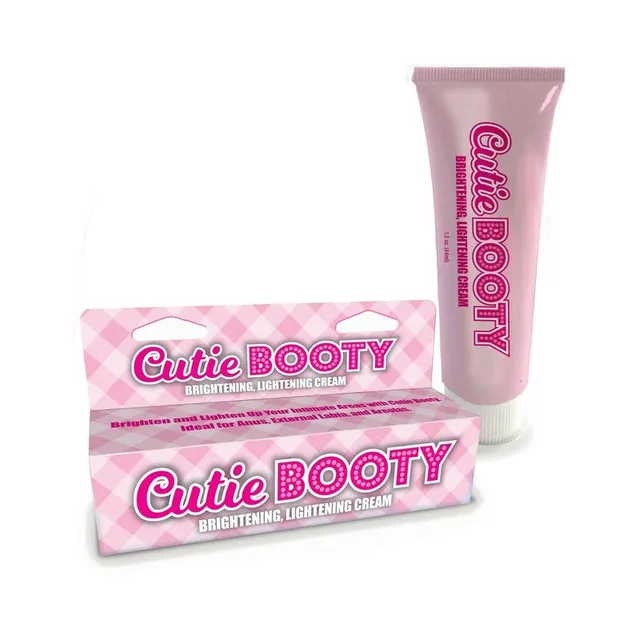 pink Cutie Booty cream tube standing behind its matching white and pink carton