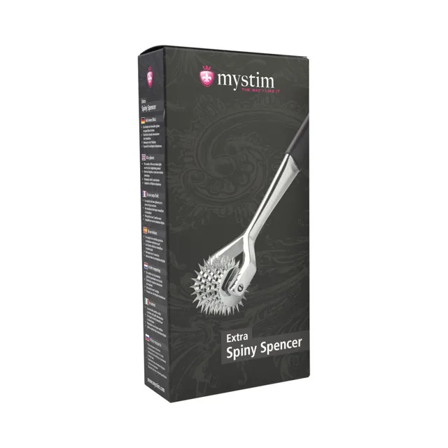 silver Mystim Extra Spiny Spencer five-wheel pinwheel leaning against its black box