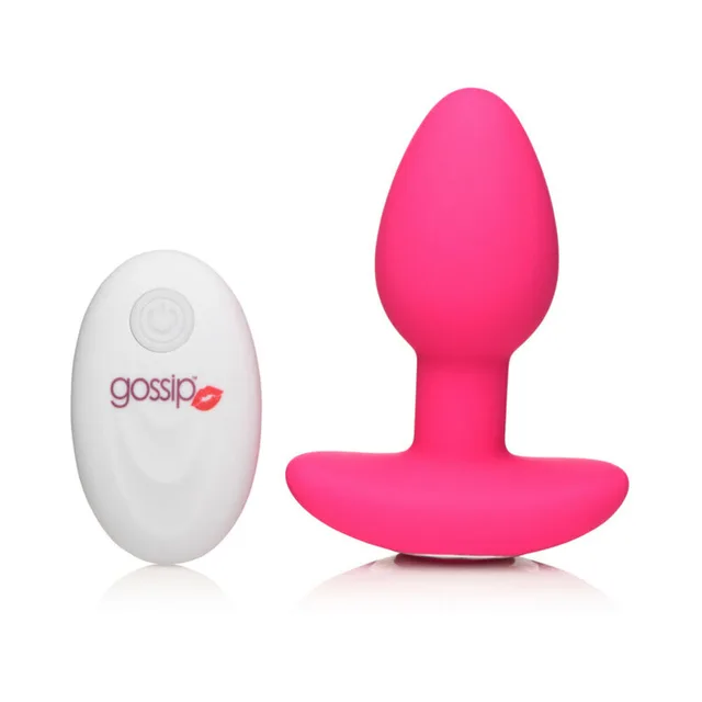 Magenta Pop Rocker plug beside white oval remote