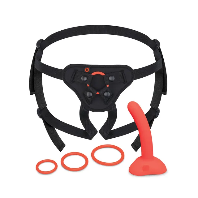 Black b-Vibe harness with orange dildo and three rings