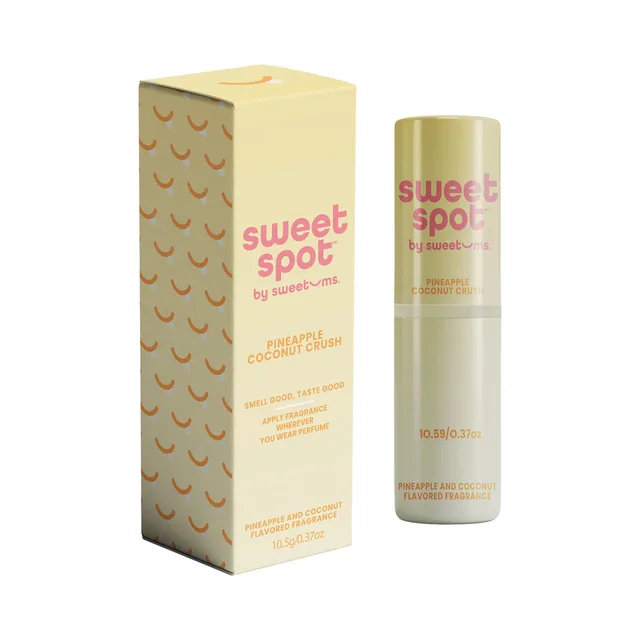 Sweetums Sweet Spot pineapple coconut crush flavored fragrance displayed as a pale yellow tube beside its retail box