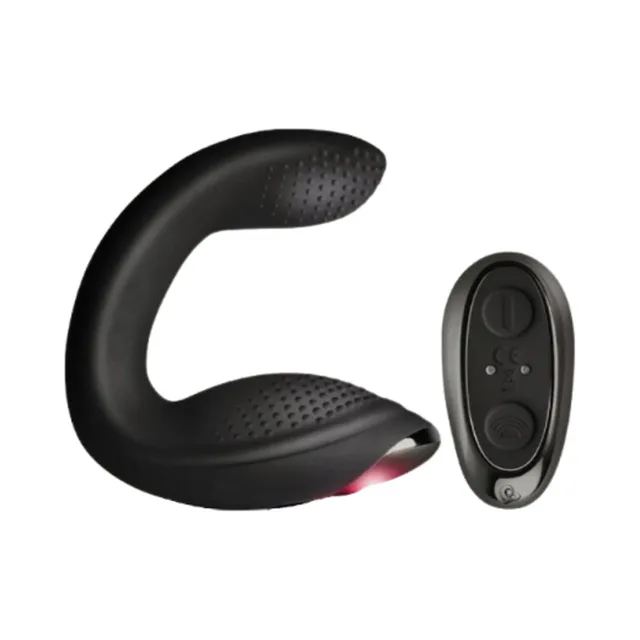 black curved Rocks-Off Rude-Boy Xtreme massager beside oval remote control
