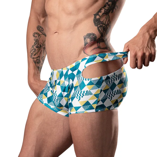 Male Power Cut It Out XL blue geometric cutout short side view worn by model