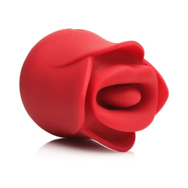Lickgasm red silicone rose lying on its side with center opening visible