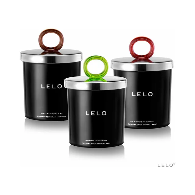 Three LELO massage candle jars with brown green and red ring handles