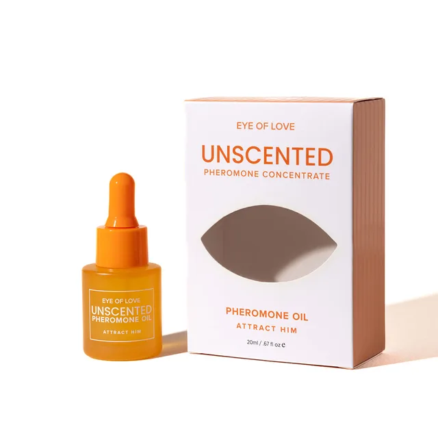 orange Eye of Love Unscented dropper bottle beside white bronze box