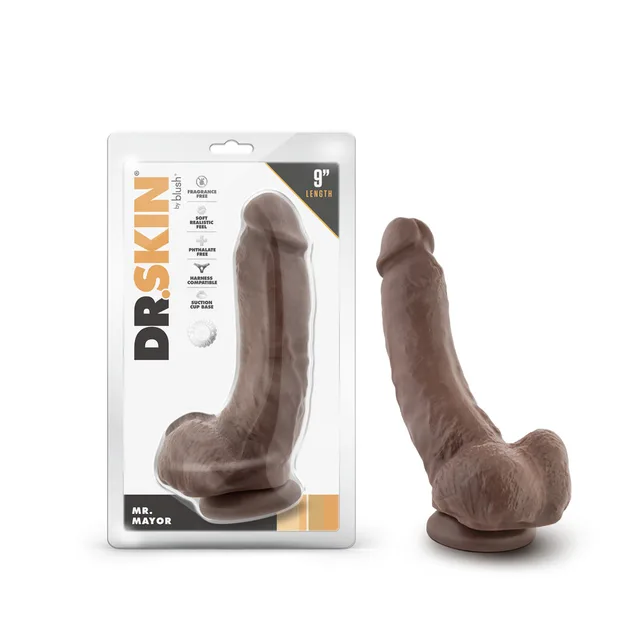 Dr. Skin Mr. Mayor Brown 9 Inch Dildo beside clear retail package