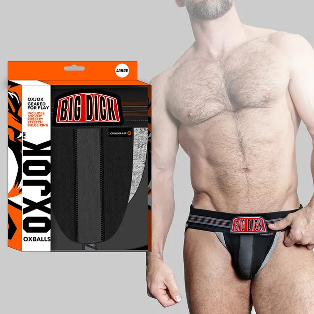 black Oxballs Oxjok Bulger jockstrap in medium beside orange and black package